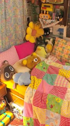 a bedroom with teddy bears and stuffed toys on the bed, along with other stuff animals