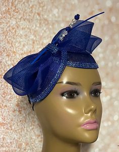 Royal Blue Sinamay Fascinator Half Hat for Church head covering, Tea Party, Wedding, and other Special Occasions  Accented with rhinestone, hat pin, and feather stem. The hat pin may vary and is for decorative purposes only. The hat is affixed to the head via a hat string. Size Approximately 9.5 by 5.5 inches (at its widest part). Handmade SHIPPING  All items for free shipping will be shipped via USPS FIRST CLASS MAIL. Gifts for mom, sister, wife, or yourself. Rhinestone Hat, Tee Party, Sinamay Fascinator, Classy Gowns, Mail Gifts, Tea Party Wedding, Wedding Petals, Wedding Fascinators, Sister Wife