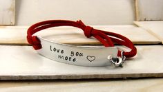 Love You More Hand Stamped Bracelet Leather by MudandRoses on Etsy, $18.00 Quote Bracelet, Custom Cuff Bracelet, I Carry Your Heart, Faux Leather Bracelets, Handstamped Bracelet, Bracelet Quotes, Stamped Bracelet, Jewelry Quotes, I Carry