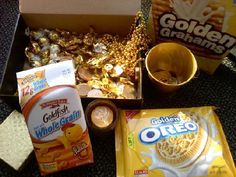 an open box filled with cookies and other snacks