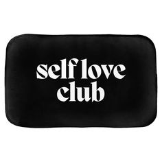 the self love club logo on a black case