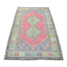 an antique persian rug is shown on a white background