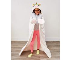 Little ones will love snuggling up with this unicorn-themed hooded throw blanket. Soft royal plush fabric is sure to keep them warm and cozy. Featuring a magical, mystical design complete with embellishments and pockets for "hooves;" this throw is a cute way to cuddle up in softness when lounging around or on the go. Ways To Cuddle, Mystical Design, Big Lots Store, Blanket Soft, Plush Fabric, Big Lots, Warm And Cozy, The Go, Throw Blanket