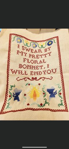 a cross - stitch sample with the words, happy new year's day written on it