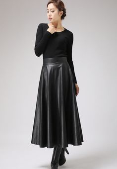 "This faux leather skirt is a timeless piece that goes with everything . This PU vegan skirt looks good away and can dress up or down with swift change of top and shoes. This maxi skirt should be your new wardrobe staple DETAIL * Soft black PU fabric * Vegan fabric * Polyester lining * Back zip closure * Two seam pockets * Midi calf Length * Suit for Autumn, winter and spring SIZE GUIDE Size vary between Brand and Country Please get your body measurement with our Size Guide And Find your size in Leather Flared Skirt For Fall, Fall Leather Flared Skirt, Elegant Faux Leather Pleated Skirt, Elegant Pleated Faux Leather Skirt, Relaxed Flared Leather Skirt, Leather Midi Skirt For Evening, Evening Leather Midi Skirt, Spring Leather Long Skirt, Elegant Faux Leather Midi Skirt