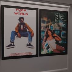 two movie posters hanging on the wall next to each other