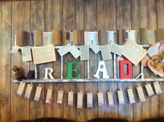 the word read spelled out with books and cats