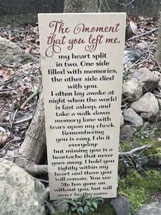 a wooden sign that reads the moment that you left me in front of some rocks