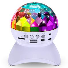 an image of a multicolored speaker with lights on it's head and speakers