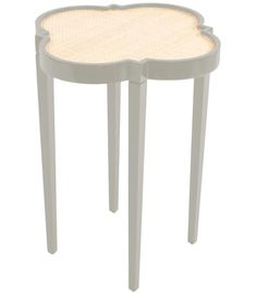 a small white table with an oval shaped top and two legs on one side,