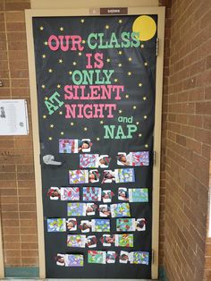 a door decorated with pictures and writing on the front wall, which reads our class is only silent night and nap