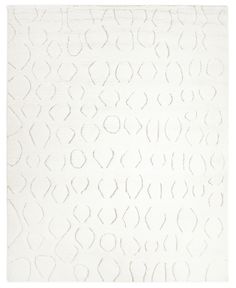 a white rug with an abstract design on the top and bottom part of it's surface