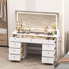 a white dressing table with drawers and mirror on it's side in a bedroom