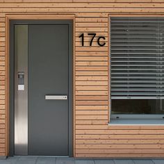 the front door of a building with a number 17c on it