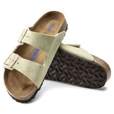 The legendary two-strap design from BIRKENSTOCK - the Arizona. Iconic style complemented with the signature comfort of the BIRKENSTOCK footbed. The tonal buckles with a textile feel and a matte design only add to this iconic style. With its additional foam layer, the soft footbed offers extra comfort all day long. The upper is made from soft suede. Birkenstock Sandals Arizona, Two Strap Sandals, Athleisure Sneakers, Birkenstock Women, Footbed Sandals, Flip Flop Shoes, Iconic Style, Birkenstock Arizona, Vegan Shoes