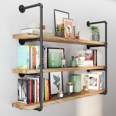 Room with PIPE 60'' Floating Pipe Shelves displaying books and decor; striking contrast of iron and wood. Room Book Shelves, Black Pipe Shelf, Kitchen Open Shelving Ideas, Long Shelves, Industrial Farmhouse Kitchen, Shelves Industrial, Pipe Shelving, Wall Shelf Display, Industrial Shelf