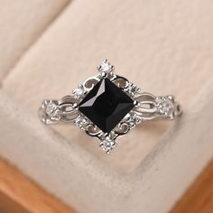 Black Wedding Rings For Women Diamond, Dainty Black Wedding Ring, Silver And Black Wedding Ring, Black Silver Ring, Black Diamond Engagement Ring Silver, Elegant Sapphire Square Cut Promise Ring, Elegant Black Birthstone Ring For Anniversary, Elegant Square Cut Sapphire Promise Ring, Elegant Silver Diamond-shaped Ring