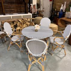 several chairs and tables in a room