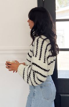 * White Striped Knit Sweater 
 * 
 
 * HOW TO STYLE: 
 * Snuggle up this winter in this cropped chunky knit () sweater (). Pair with some jeans () and slippers and you'll be set for weekend markets or brunch with the girls. 
 * 
 
 * FEATURES: 
 * Black stripe detailing 
 * Cuffed long sleeves 
 * Chunky knit fabrication 
 * Heavy weight material 
 * Slight stretch 
 * Pull on style 
 * Unlined 
 * Cropped Length Pullover Sweaters Women, Autumn Chic, Striped Knit Sweater, White Striped Sweater, Cotton Decorations, Sweaters Women, Striped Pullover, Pullover Sweater Women, Chunky Knits Sweater