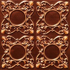 four gold decorative pieces on a brown background