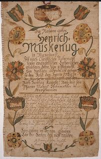 an old scroll with flowers on it