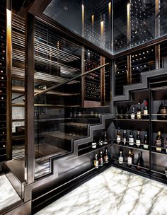 a wine cellar filled with lots of bottles