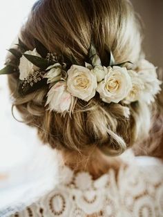 a woman with flowers in her hair