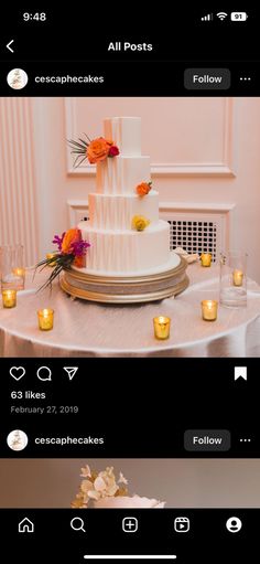 the wedding cake is sitting on the table with candles in front of it, and there are