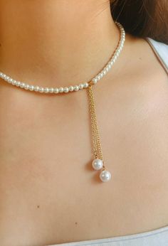 Discover the timeless elegance of our Handmade 16"  faux pearl necklace. Crafted with precision and care, each bead captures the classic beauty of pearls, creating a stunning accessory that adds a touch of sophistication to any outfit. Perfect for both casual and formal occasions, this necklace is a must-have for anyone who appreciates fine craftsmanship and style. Cheap Elegant Beaded Necklaces, Cheap Elegant Beaded Necklaces As Gifts, Cheap Beaded Formal Jewelry, Elegant Cheap Necklaces With Dangling Beads, Cheap Elegant Beaded Chain Jewelry, Cheap Elegant Beaded Necklaces For Parties, Cheap Beaded Jewelry For Formal Occasions, Luxury Elegant Beaded Necklace With Adjustable Chain, Cheap Elegant Beaded Necklace