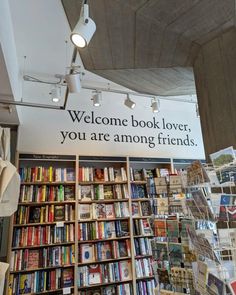 there is a sign that says welcome book lover, you are among friends