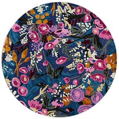 a blue plate with pink and purple flowers on it