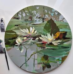 a painting of water lillies in a pond