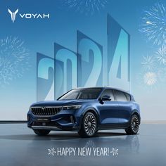 a blue suv with fireworks in the background and happy new year written across the front