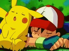 pikachu and eena laying on the ground with their arms around each other