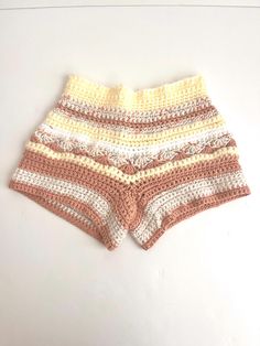 Shorts crocheted cream and pink handmade unique style boho fashion handcrafted shorts for vacation loungewear Handmade Summer Bottoms For Vacation, High-waisted Beige Shorts For The Beach, Beige High-waisted Shorts For The Beach, Beige High-waisted Shorts For Beach, Beachwear Shorts With Crochet Trim, Crochet Shorts For Spring Vacation, Crochet Shorts For Vacation In Spring, Vacation Beach Shorts With Crochet Trim, Vacation Shorts With Crochet Trim For Beach Season