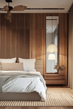 a bedroom with wood paneling and white bedding