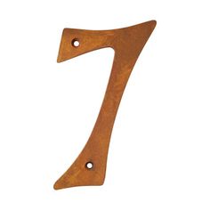 a metal number seven on a white background