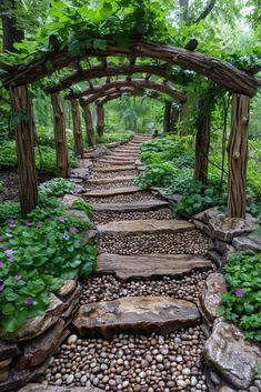 a stone path in the middle of a forest