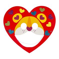 a red heart shaped mask with hearts on it's face and eyes, in the shape of a cat