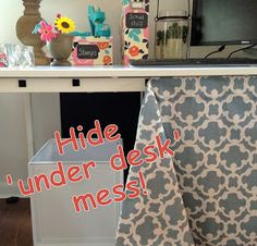 a desk with several items on it and the words hide under desk measl