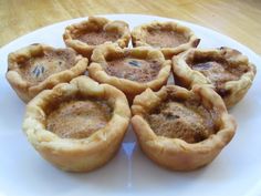 small pies on a white plate ready to be eaten