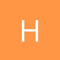 the letter h on an orange background