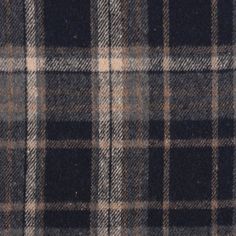 a black and tan plaid fabric textured with flannel or checkered wool