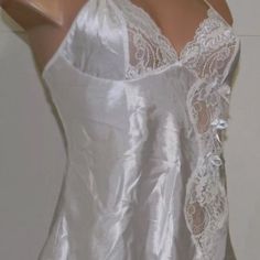 Fredricks Of Hollywood Strappy Lingerie Top White Satin With Lace Trim & Bows In Excellent “Like New” Condition. I Doubt This Has Been Worn. New With Out Tags Nwot Or May Be Considered Nwt. 100% Polyester. Hand Wash/Line Dry. See Pictures For Details. Colors May Vary Due To Screen Differences & Lighting. Womens Size Small Measurements Laying Flat Unstretched: Chest Armpit To Armpit Is 16” Hundreds Of New & Preloved Items! Bundle & Save With Combined Shipping! All Items Must Be Bundled Together. Once You Agree To An Offer You Cannot Add More Items. Please Bundle & Send Me A Reasonable Offer, I Will Either Accept Or Counter. Female Females Women Womens Ladies Ladys Feminine Sexy Emb Black Silk Robe, Black Lace Corset, Vintage Bra, Red Lace Bra, Strappy Lingerie, Lingerie Top, Floral Corset, Steampunk Corset, Lingerie Tops