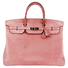 Hermès 2013 Birkin 40cm Matte Crocodile Porosus leather bag. Made in France, this beautiful 2013 Hermès ‘Birkin’ handbag has been made from a dusty pink-tone ‘Matte Crocodile Porosus’ exterior in ‘Bois de Rose’, this piece is decorated with silver hardware and has an hourglass stamp. Pink alligator, pink leather. Twist lock fastening at front. Comes with padlock and key. Width: 15.5 in. Height: 11.4 in. Depth: 8.1 in. Handle Drop: 4 in Birkin Bag 40 Cm, Hermes Bags Birkin, Birkin Purse, Birken Bag, Pink Alligator, 100 Bill, Birkin Bags, Armani Hotel, Hermes Birkin Handbags