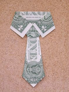 an origami tie made out of one dollar bill