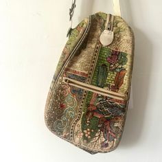 Hello there vintage lovers! I bring you a very unique purse. Tapestry style bag has a interesting Ottoman art print. Handle at the top. Zipper down the middle. Please see the wear in the photos. Most likely from the 1940s. Measurement: 8" wide 13" tall Thank you for stopping by! *Note about my packaging. I like to do my part to help the environment so because of that I reuse boxes. So your order may come in a recycled or a box that had a previous life. Yay for recycling! Follow @windfallvtg on Instagram for sneak peeks, shop updates, and sales! Reuse Boxes, Ottoman Art, Ottoman Design, Vintage Lovers, Unique Purses, Vintage Lover, Previous Life, Hello There, Bags Purses