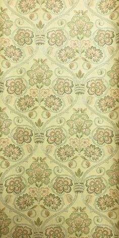 an old fashioned wallpaper with floral designs on it