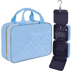 two pieces of blue luggage sitting next to each other on top of a white background