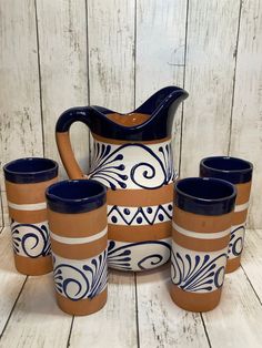 Authentic Mexican pottery hand made in the areas of JaliscoMadeof terracottaNatural terracotta outsideVarnished insidegift set includes 1Jar 11tallabout 4qts capacityVery sturdylarge handle 4Tumblers 716oz capacityTerracotta outsideVarnished insideFood gradeBeautiful set/gift for your everydayspecial eventsbrunchPerfect for aguas frescasiced teajuicecoffeechampurradoand much morePerfect decor for your kitchen or living roomPitcher Not Spanish Pottery Decor, Modern Mexican Dishware, Mexican Mugs Pottery, Mexican Kitchenware, Mexican Barro Decor, Mexican Pottery Designs, Mexican Dishware, Mexican Kitchen Decor Modern, Mexican Pottery Decor